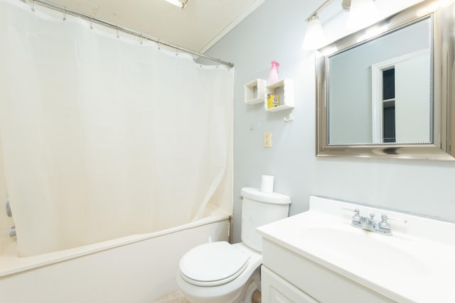 full bathroom featuring toilet, vanity, and shower / bath combo with shower curtain