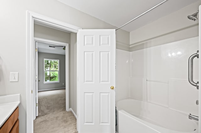 bathroom with vanity and shower / bathing tub combination