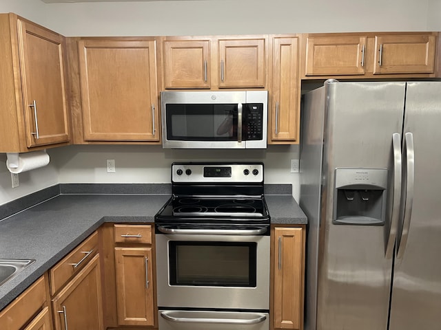 kitchen featuring appliances with stainless steel finishes and sink