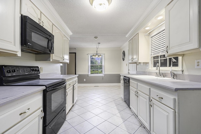 kitchen featuring black appliances, crown molding, sink, and a textured ceiling