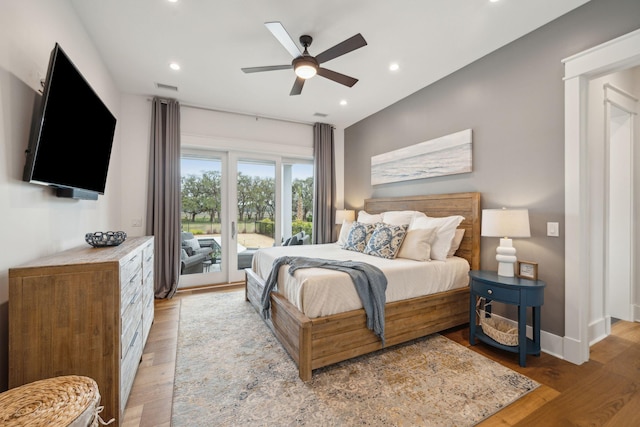 bedroom with recessed lighting, visible vents, light wood-style floors, access to outside, and baseboards