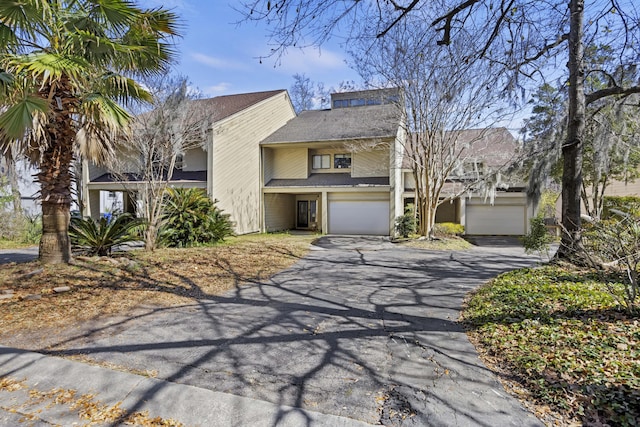 view of front of home with a garage and driveway