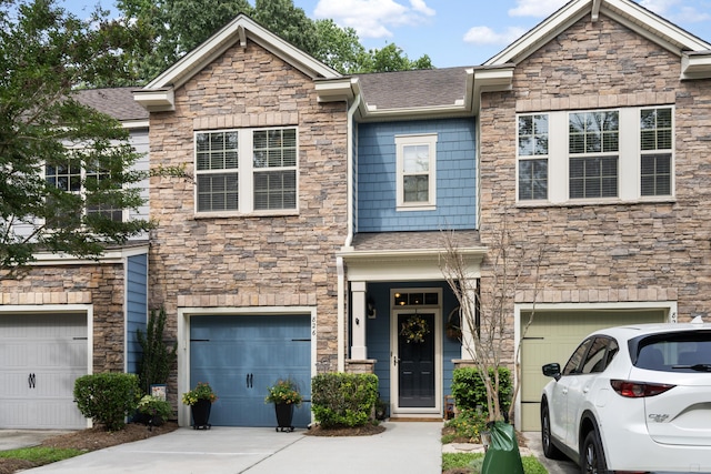 826 Bibury Ct, Charleston, SC 29414 - view of front of house featuring stone siding, a garage, and concrete driveway