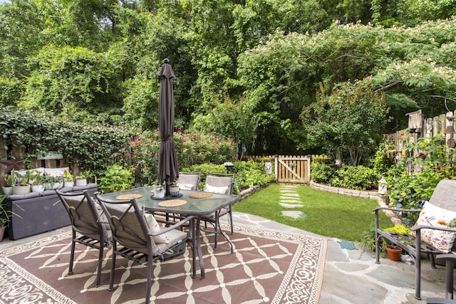 826 Bibury Ct, Charleston, SC 29414 - view of patio with outdoor dining space and a gate
