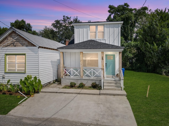 view of front of house with a yard