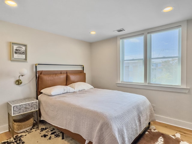 bedroom featuring hardwood / wood-style flooring