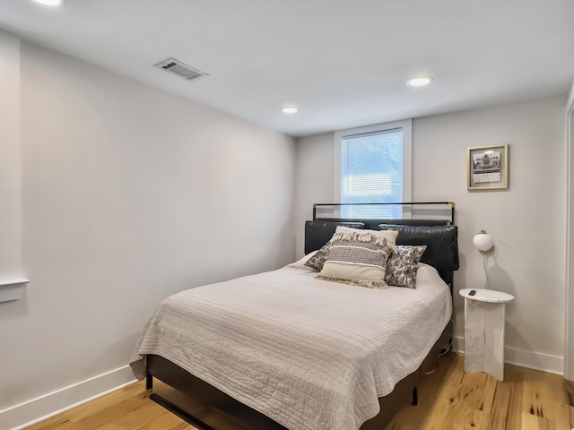 bedroom featuring light hardwood / wood-style floors