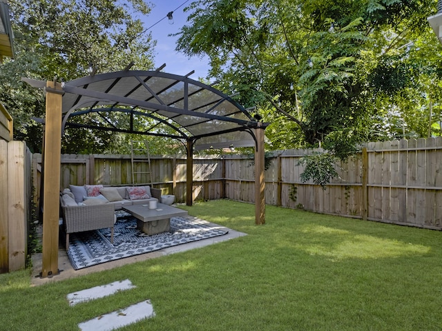 view of yard featuring an outdoor living space with a fire pit and a pergola