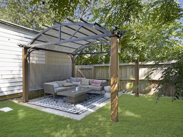 exterior space featuring outdoor lounge area, a lawn, and a pergola