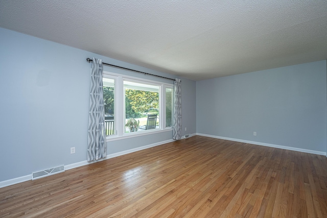 2847 Limestone Blvd, Charleston, SC 29414 - empty room featuring wood finished floors and a textured ceiling