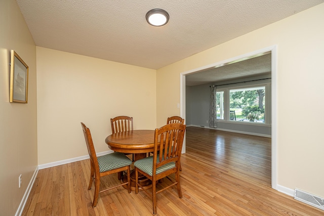 2847 Limestone Blvd, Charleston, SC 29414 - dining area featuring light wood-style floors and a textured ceiling