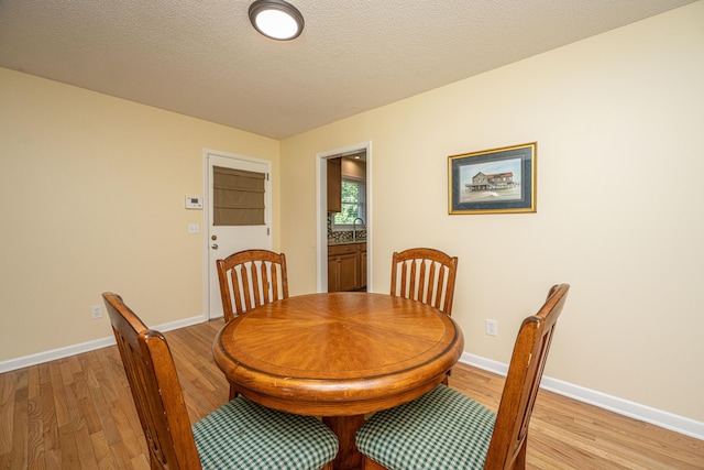 2847 Limestone Blvd, Charleston, SC 29414 - dining area with light wood-style flooring and baseboards