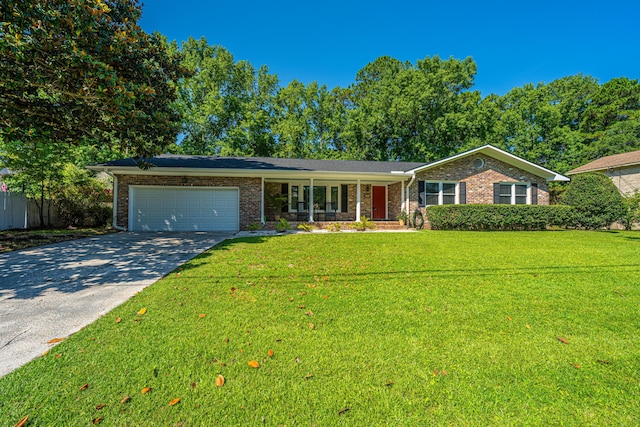 2847 Limestone Blvd, Charleston, SC 29414 - ranch-style home featuring an attached garage, driveway, brick siding, and a front yard
