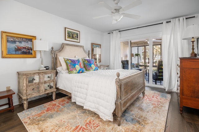 bedroom with access to exterior, dark hardwood / wood-style floors, and ceiling fan