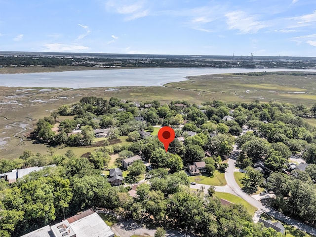 aerial view of property and surrounding area with a large body of water