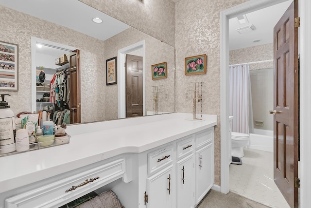 full bath featuring wallpapered walls, vanity, toilet, tile patterned floors, and shower / bath combination with curtain
