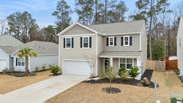 front of property with a garage