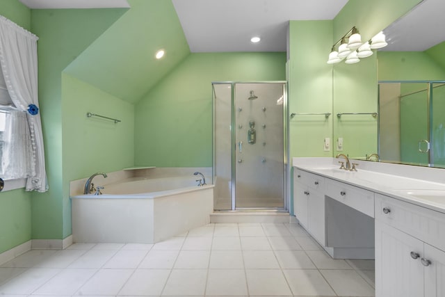 bathroom featuring double vanity, a stall shower, tile patterned flooring, a bath, and a sink