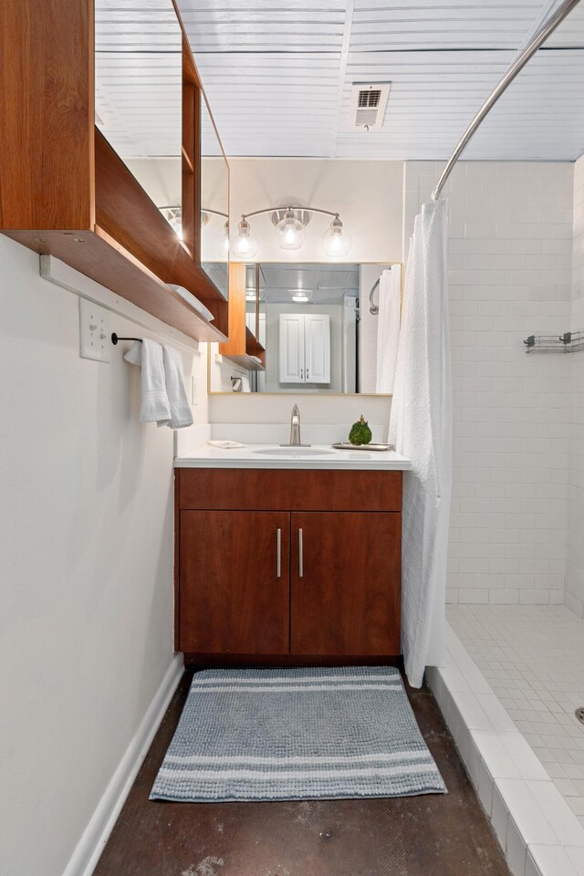 1 Cool Blow St Unit 124, Charleston, SC 29403 - full bath featuring a stall shower, vanity, baseboards, and concrete floors
