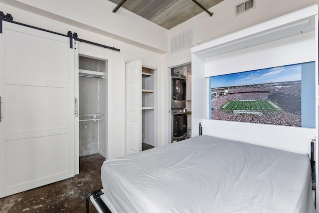 1 Cool Blow St Unit 124, Charleston, SC 29403 - bedroom featuring a barn door and concrete flooring
