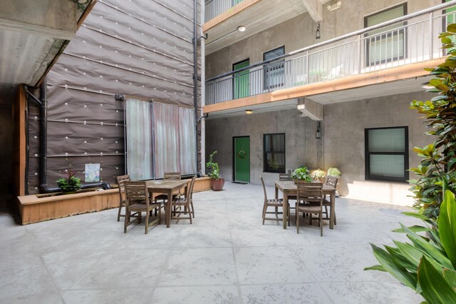 1 Cool Blow St Unit 124, Charleston, SC 29403 - view of patio / terrace featuring outdoor dining area and a balcony