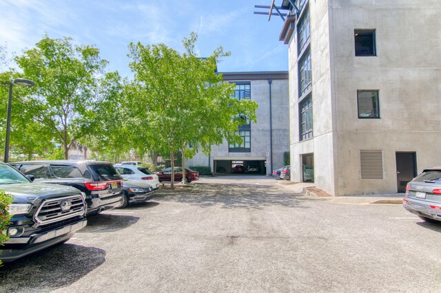 1 Cool Blow St Unit 124, Charleston, SC 29403 - view of building exterior featuring uncovered parking