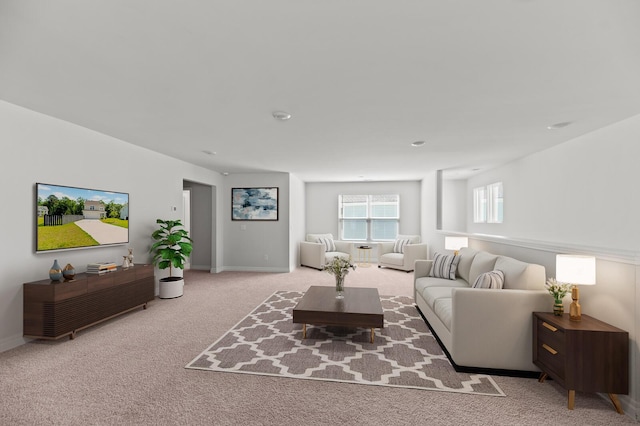 living room with carpet and baseboards
