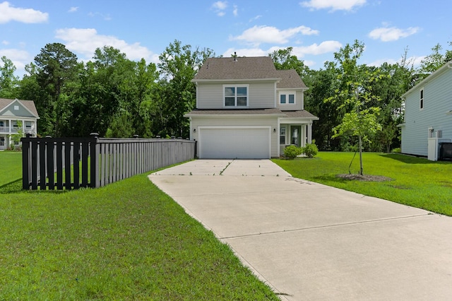 traditional-style home featuring driveway and an attached garage