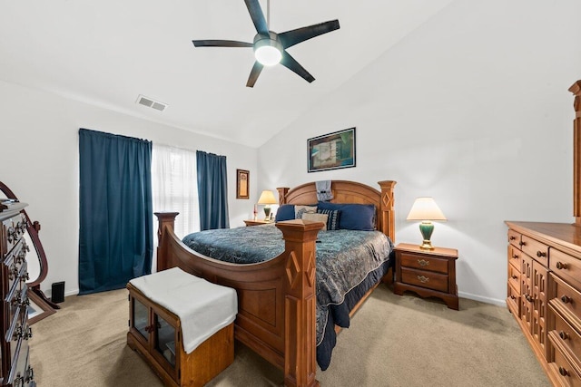 bedroom with lofted ceiling, light colored carpet, a ceiling fan, baseboards, and visible vents