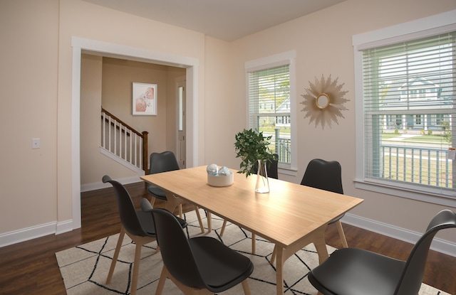 dining room with stairs, dark wood-type flooring, and baseboards