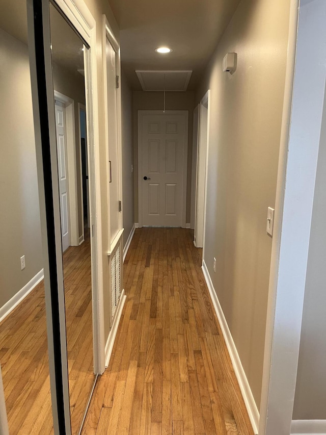 105 Pandora Dr, Goose Creek, SC 29445 - hall with attic access, light wood finished floors, and baseboards