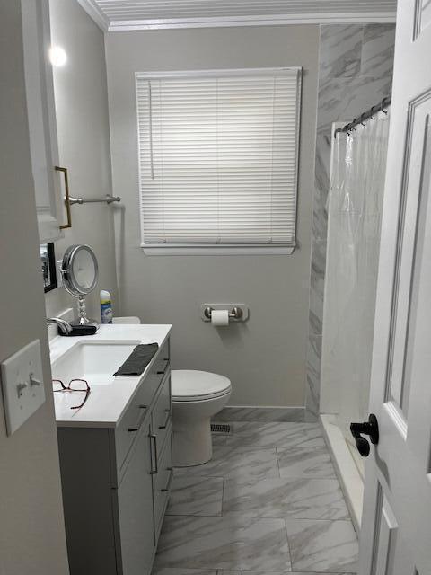 105 Pandora Dr, Goose Creek, SC 29445 - bathroom with marble finish floors, vanity, crown molding, toilet, and a shower with shower curtain