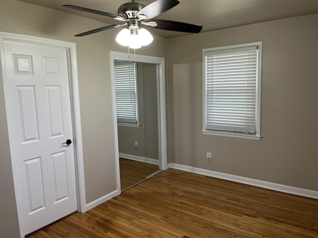 105 Pandora Dr, Goose Creek, SC 29445 - unfurnished bedroom with a closet, baseboards, wood finished floors, and ceiling fan