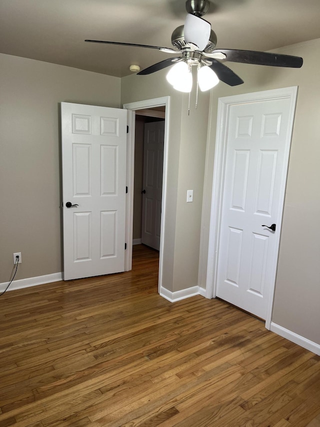105 Pandora Dr, Goose Creek, SC 29445 - unfurnished bedroom featuring baseboards, wood finished floors, and ceiling fan