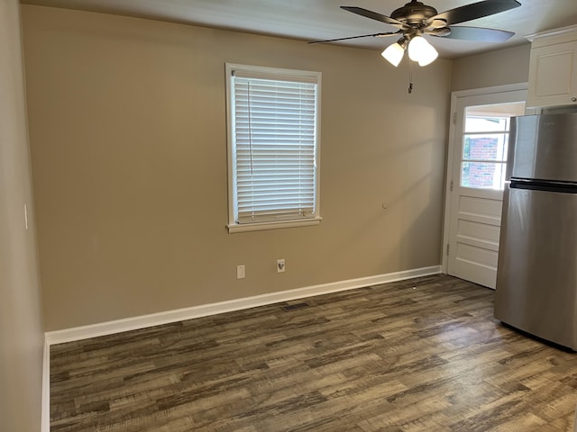 105 Pandora Dr, Goose Creek, SC 29445 - kitchen featuring freestanding refrigerator, wood finished floors, ceiling fan, white cabinetry, and baseboards