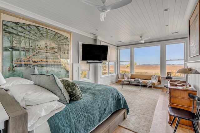 bedroom with crown molding, ceiling fan, and wooden ceiling