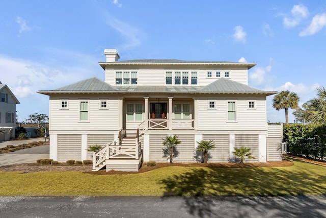 view of front of property featuring a front yard