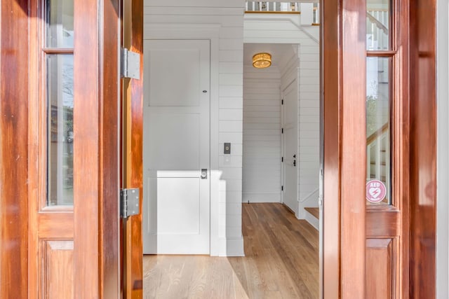 hallway featuring light hardwood / wood-style flooring