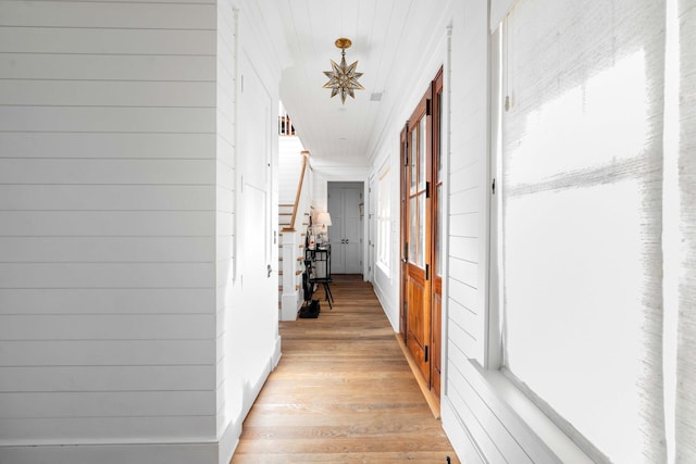 hallway featuring light wood-type flooring