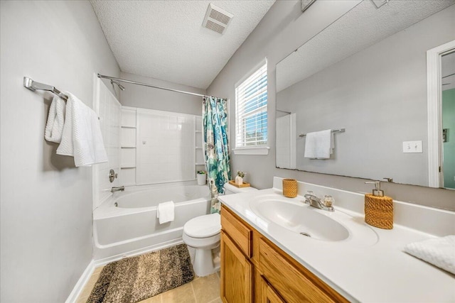 full bath with visible vents, shower / bath combo with shower curtain, toilet, vanity, and a textured ceiling