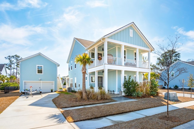 view of front of home featuring a garage, central AC, a balcony, and a porch