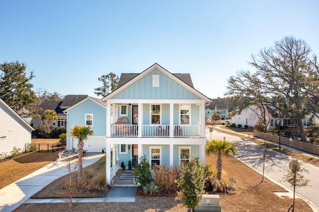 view of front of house featuring a porch and a garage