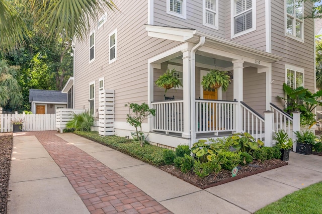 view of property exterior featuring a porch