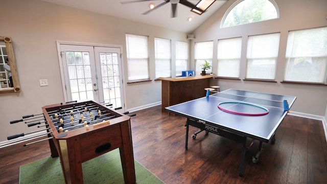 rec room featuring lofted ceiling, french doors, dark hardwood / wood-style floors, and ceiling fan