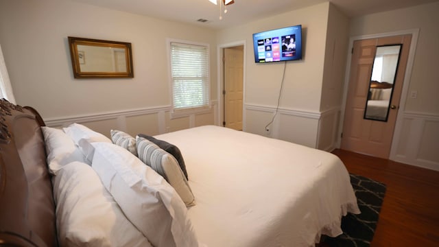 bedroom featuring dark hardwood / wood-style flooring