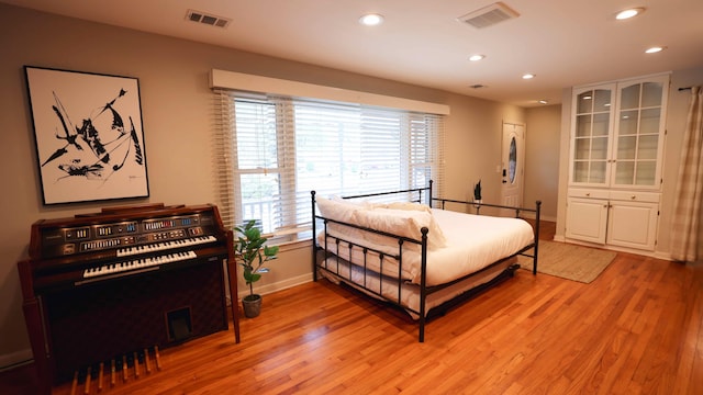 bedroom featuring light hardwood / wood-style floors