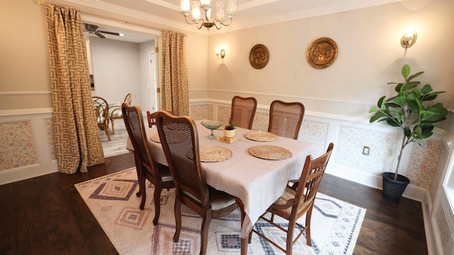 dining area featuring crown molding, dark hardwood / wood-style floors, and ceiling fan with notable chandelier