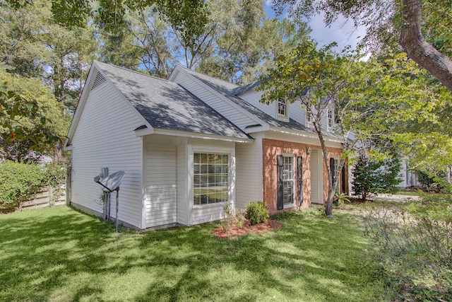 exterior space with a front yard