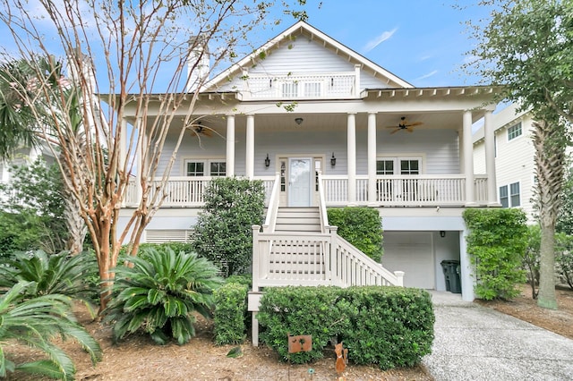 view of front of house with ceiling fan and a porch