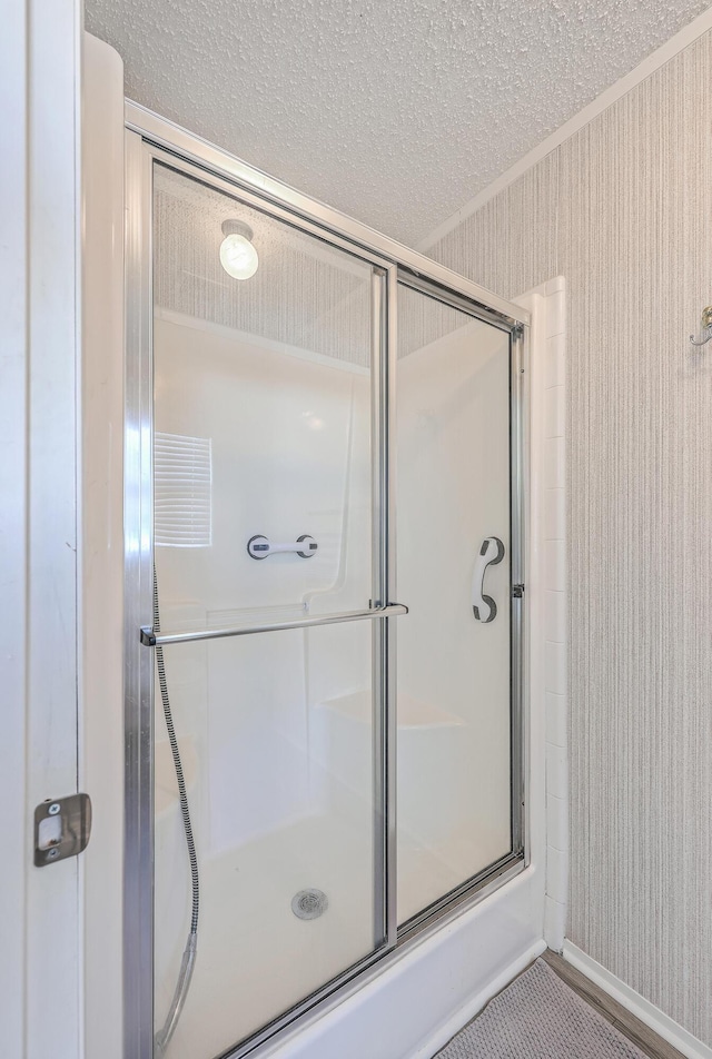 bathroom featuring walk in shower and tile patterned floors